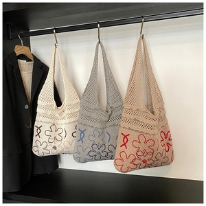 Three knit tote bags in white, gray, and khaki featuring hollow mesh and floral patterns