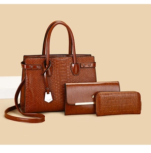 Three-piece brown faux leather handbag set with crocodile embossing and silver hardware