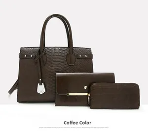 Detailed view of coffee brown crocodile pattern 3-piece bag set with tote and wallet