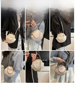 Chic embroidered shell bag with pearl handle shown on model in various angles