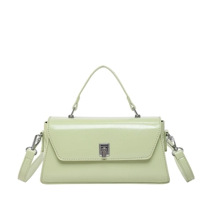 Sleek light green crossbody handbag with a glossy finish and silver buckle on white background