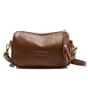 Sac bandoulière vintage marron en cuir texturé avec fermeture éclair en métal doré