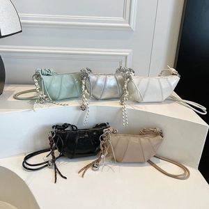 Women Croissant Shoulder Bag Glossy PU Leather Quilted Crescent Crossbody Bag With Knot Strap And Metallic Pendant
