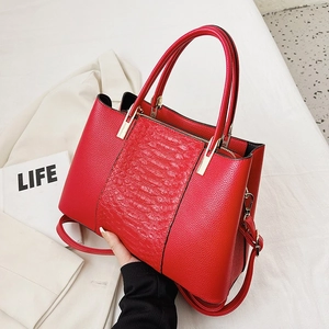 Elegant red crocodile texture tote bag with leather patchwork and gold hardware for women