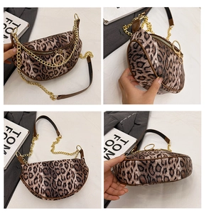 Detailed four-way view of leopard print crescent bag with gold chain and ring zippers