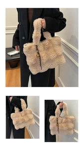 Detail of plush beige tote bag featuring soft faux fur texture and decorative bell charm
