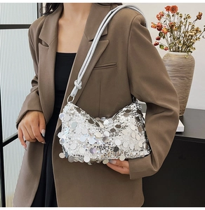 Chic silver sequin shoulder bag shown over a casual brown blazer for a trendy party look