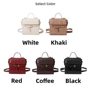 Detailed display of vintage square handbags in white, khaki, red, coffee, and black tones