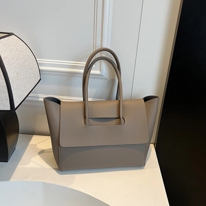 Deep khaki pebbled leather tote bag with flap closure and long handles for women