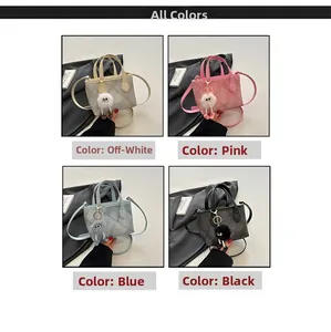 Quilted crossbody bucket bags in cream, pink, blue, and black with cute plush charms