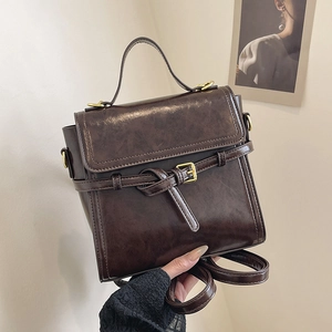 Retro dark brown crossbody bag with marble texture and brass buckle for spring