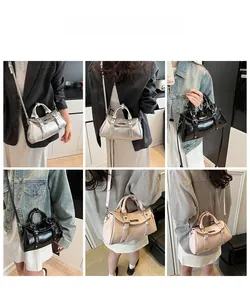Multiple views of retro Boston handbag in silver, black and pink with crossbody strap