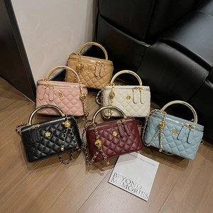 Quilted vanity box bag collection with metal top handles and chain straps in six colors
