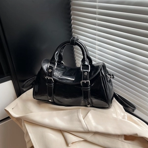 Retro black glossy patent leather Boston handbag with silver buckle and rivets