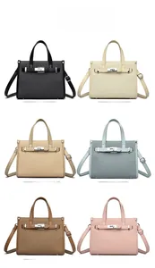Litchi pattern satchel bags in six colors with metallic turn-lock and adjustable straps