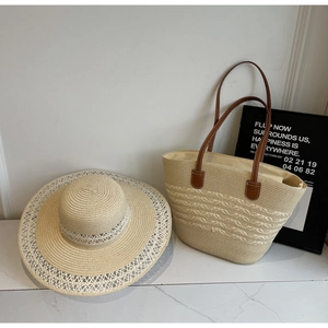 Handmade striped straw tote bag and sun hat set with leather handles for summer travel