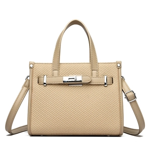 Chic beige textured woven satchel with leather trim and silver metal hardware details