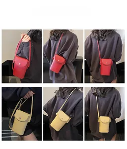 Detailed views of minimalist leather crossbody bags in red and beige worn by a model