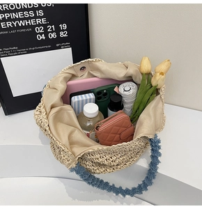 Detailed interior view of woven straw tote showing high storage capacity for daily essentials