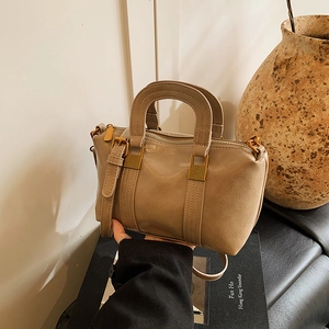 Taupe Boston style handbag with retro gold hardware and detachable shoulder strap