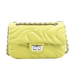 Neon yellow quilted crossbody bag with wave pattern and silver chain strap