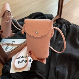 Pink lychee texture crossbody phone bag with flap and silver snap button closure