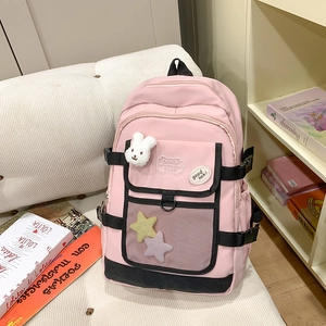 Pink large capacity backpack with cute plush rabbit charm and fashion badges