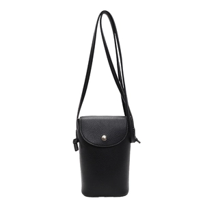 Minimalist black pebble grain shoulder bag with metal magnetic closure for women