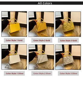 Detail of acrylic evening bags with gold dragon handles and various textures