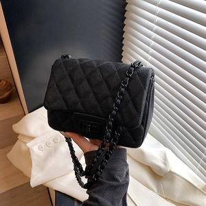 Classic black quilted crossbody bag with metal chain strap and turn-lock closure