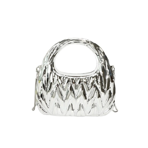 Silver metallic pleated cloud bag with rounded handle and chain for a modern y2k fashion look