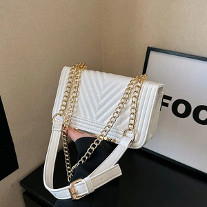 White quilted leather crossbody bag with elegant gold chain strap and metal hardware