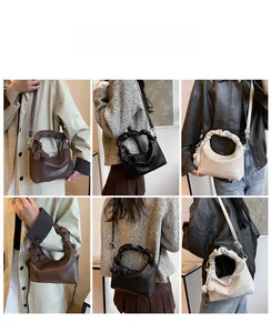 Leder-Umhängetasche mit gewebtem Knoten-Detail und plissiertem Griff in verschiedenen Farben
