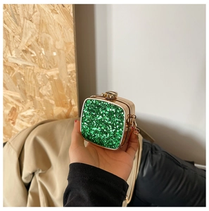 Mini green glitter acrylic evening bag with gold chain and vintage metal clasp closure