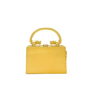 Golden acrylic box bag with ornate dragon handle and icy texture for evening wear