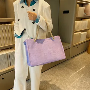 Lilac purple canvas tote bag featuring thick braided rope straps and silver eyelets