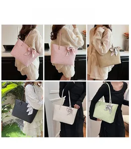 Detail showing woven texture tote bags in five colors with decorative silk scarves on handles