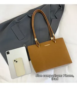 Caramel brown suede tote bag showing internal capacity with iPad and smartphone comparison