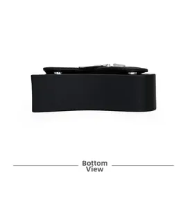 Detailed bottom view of the black minimalist crossbody bag featuring silver metal rivets