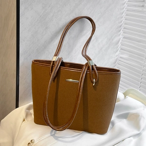 Retro camel suede tote bag with large capacity and gold metal hardware in side view