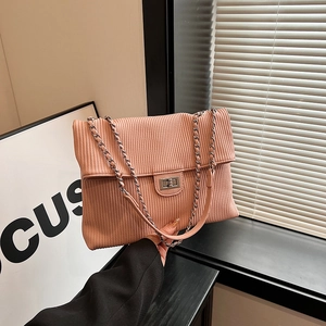 Pink pleated tote bag with chain strap and metallic lock for spring 2025 fashion