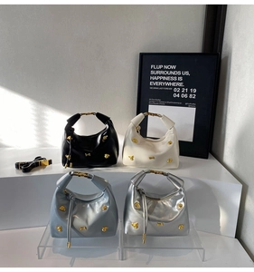 Modern hobo handbags in multiple colors featuring unique golden animal-shaped metal studs