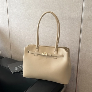 Minimalist beige PU leather tote bag with gold twist-lock and long double handles