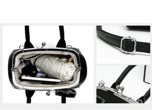 Dettaglio borsa in pelle nera con interno spazioso e fibbie metalliche regolabili