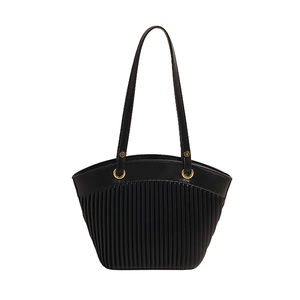 Minimalist black pleated tote bag with large capacity and gold eyelet shoulder straps