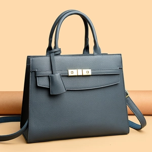 Elegant dark blue lychee grain leather tote bag with gold hardware and shoulder strap