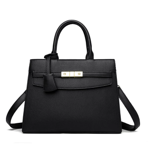Elegant black pebbled leather tote bag with gold hardware and top handle for women
