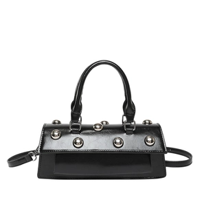 Fashionable black baguette handbag with silver rivets and detachable shoulder strap
