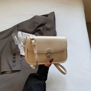 Minimalist cream beige PU leather crossbody square bag with silver buckle and adjustable strap