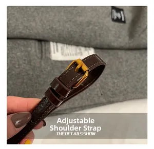 Detail of adjustable dark coffee leather strap with premium gold square metal buckle